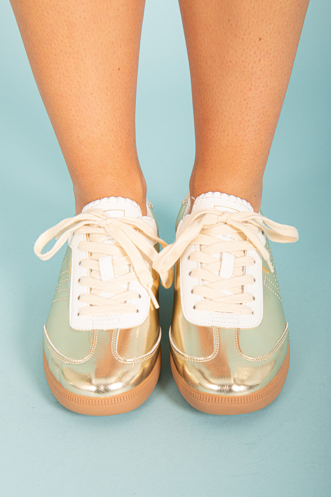 Upgrade your sneaker game with our Gold Sneaker Dotted VH! Give your feet the comfort and support they deserve while making a bold fashion statement. Elevate your outfit and confidence with our Gold Sneaker Dotted VH.