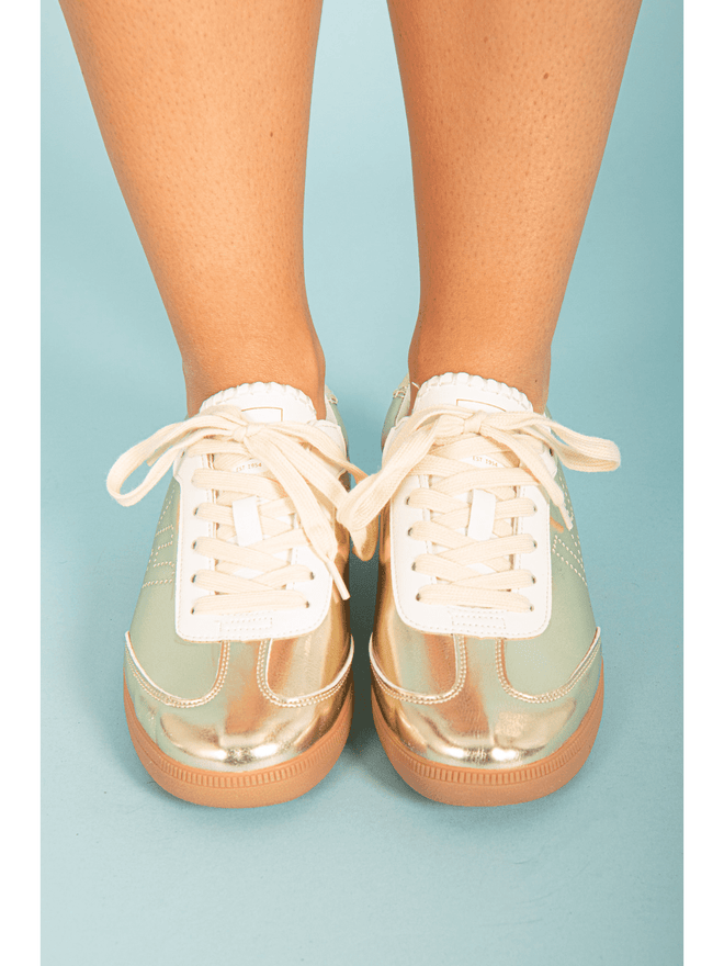 Upgrade your sneaker game with our Gold Sneaker Dotted VH! Give your feet the comfort and support they deserve while making a bold fashion statement. Elevate your outfit and confidence with our Gold Sneaker Dotted VH.