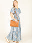 Pre-Order: Blue Palm Print Tiered Maxi Dress