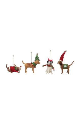 Four dog-shaped Christmas ornaments on a white background