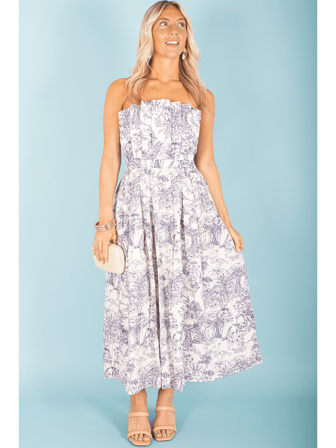 Elevate your wardrobe with our stunning Floral Strapless Midi Dress. Perfect for any occasion, this dress features a gorgeous floral design and a flattering strapless neckline. Embrace your feminine side and make a statement with this must-have dress.