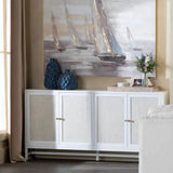 Living room with a white cabinet, decorative vases, and a large painting of sailboats.
