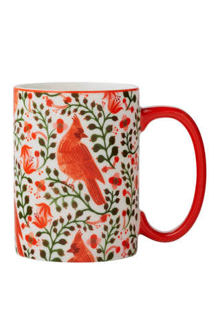 Mug with red cardinal bird and floral pattern on a white background