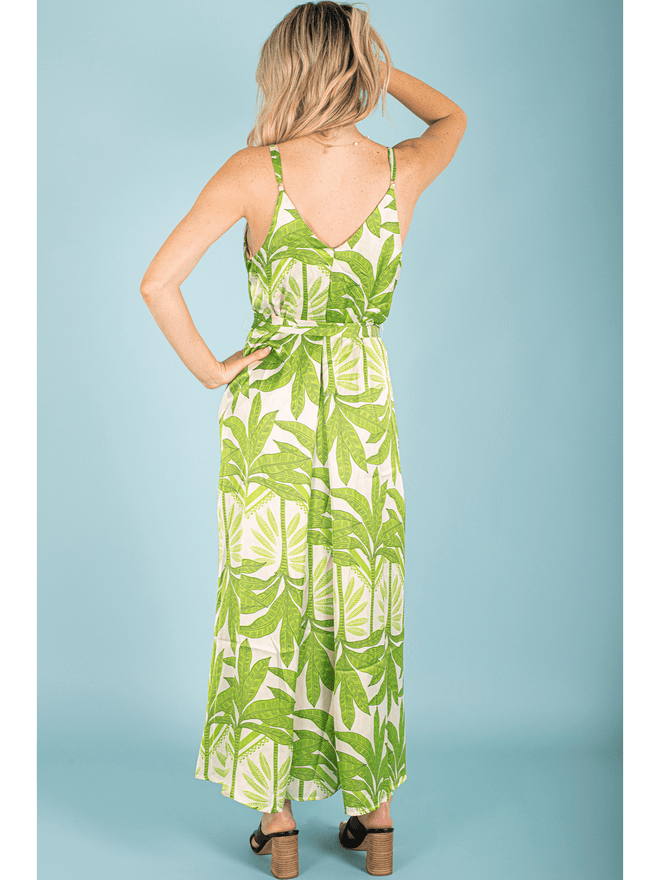 Be the life of the party in our Tropical Breeze Maxi Dress! With its vibrant colors and flowing design, this dress will make you stand out in a crowd. Perfect for any occasion, it's a must-have addition to your wardrobe. Get ready to turn heads and feel like a tropical goddess!