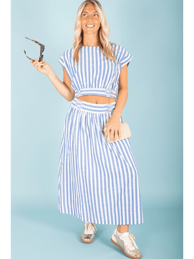 Embrace the timeless trend with our Striped Skirt! Made with high-quality fabric, this skirt features bold stripes that will elevate any outfit. Designed for comfort and style, this skirt will surely become a staple piece in your wardrobe. Get ready to turn heads and make a statement with our Striped Skirt!