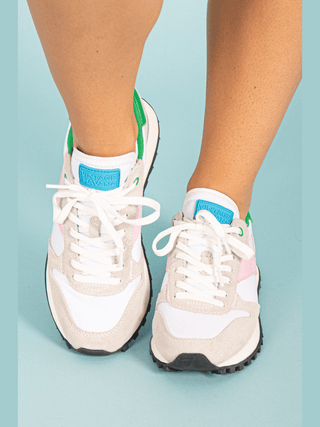 Experience the perfect combination of style and function with our Pink Green &amp; White Running Sneaker! Made with top-quality materials, these sneakers provide both comfort and support for your active lifestyle. Stay ahead of the fashion game while achieving your fitness goals. Step into confidence and run towards your dreams with every stride!