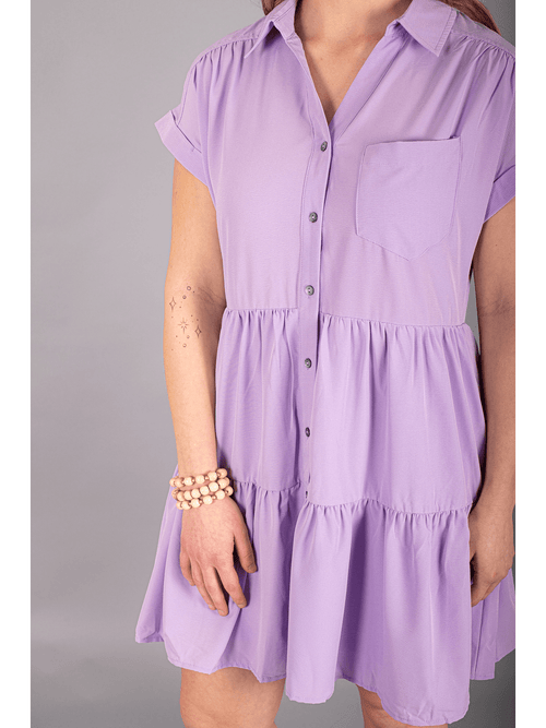 Beautiful lavender 3 tier dress with button up front collared neck and front pocket. 