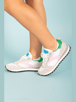 Experience the perfect combination of style and function with our Pink Green &amp; White Running Sneaker! Made with top-quality materials, these sneakers provide both comfort and support for your active lifestyle. Stay ahead of the fashion game while achieving your fitness goals. Step into confidence and run towards your dreams with every stride!