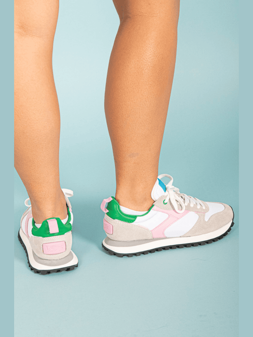 Experience the perfect combination of style and function with our Pink Green &amp; White Running Sneaker! Made with top-quality materials, these sneakers provide both comfort and support for your active lifestyle. Stay ahead of the fashion game while achieving your fitness goals. Step into confidence and run towards your dreams with every stride!