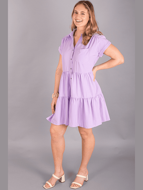 Beautiful lavender 3 tier dress with button up front collared neck and front pocket.