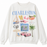 White Charleston crewneck sweatshirt featuring pastel watercolor artwork of a sailboat, palm tree, pink convertible, seashells, and beach accessories.