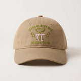 Beige cap with 'Charleston Social Club' embroidery on a light beige background
