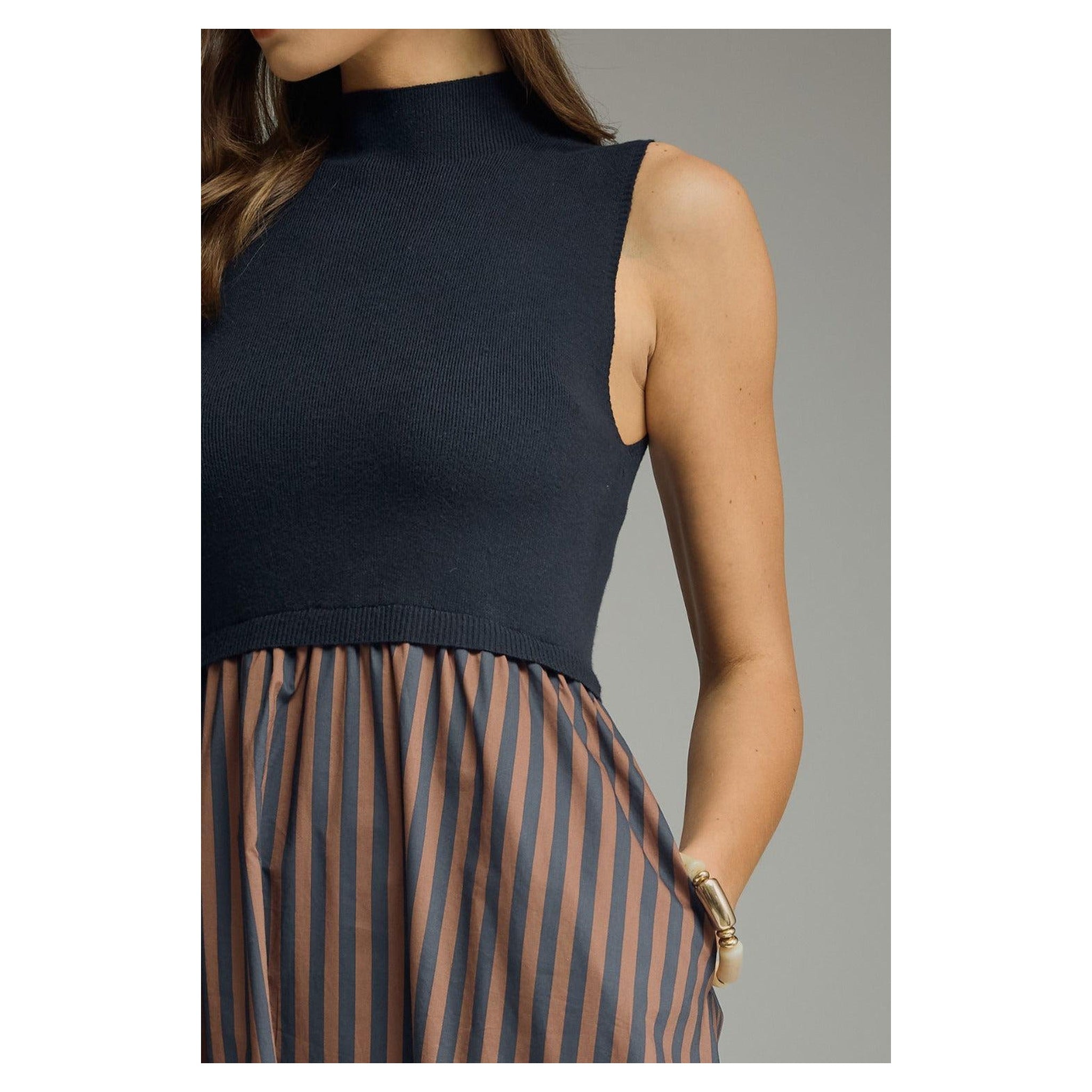 Navy dress bodice and striped skirt detail