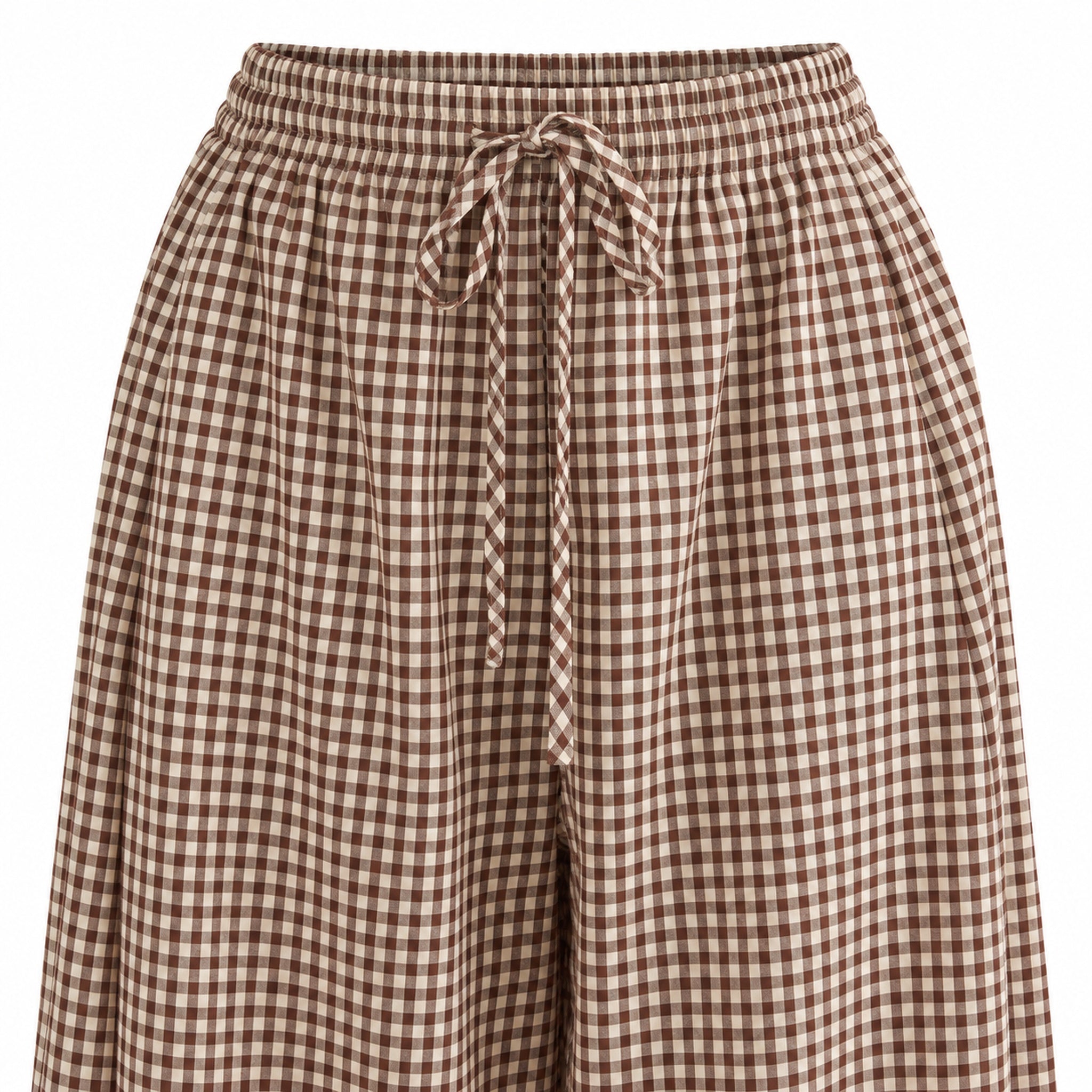Close-up of brown gingham fabric, elastic waistband and matching drawstring