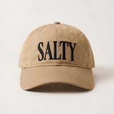 Beige cap with 'SALTY' text on a light beige background