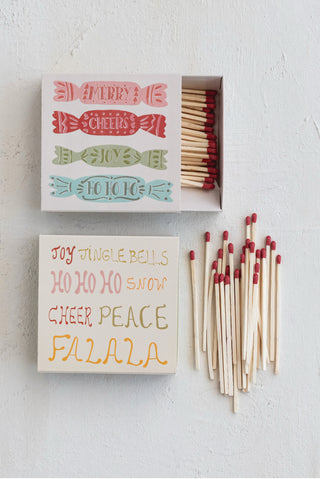 Matches with decorative packaging on a white background
