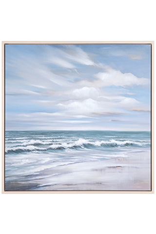 Framed artwork of a seascape with waves and sky.