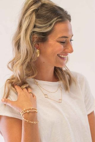 Stationed Gold Ball Bracelets