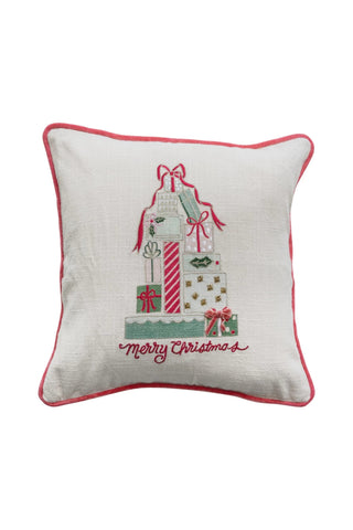 Decorative pillow with Christmas-themed embroidery on a white background