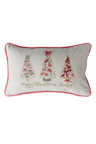 Decorative pillow with embroidered Christmas trees and text on a white background