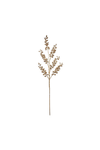 Artificial plant stem with small branches on a white background