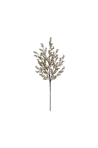 Artificial plant stem with small branches on a white background