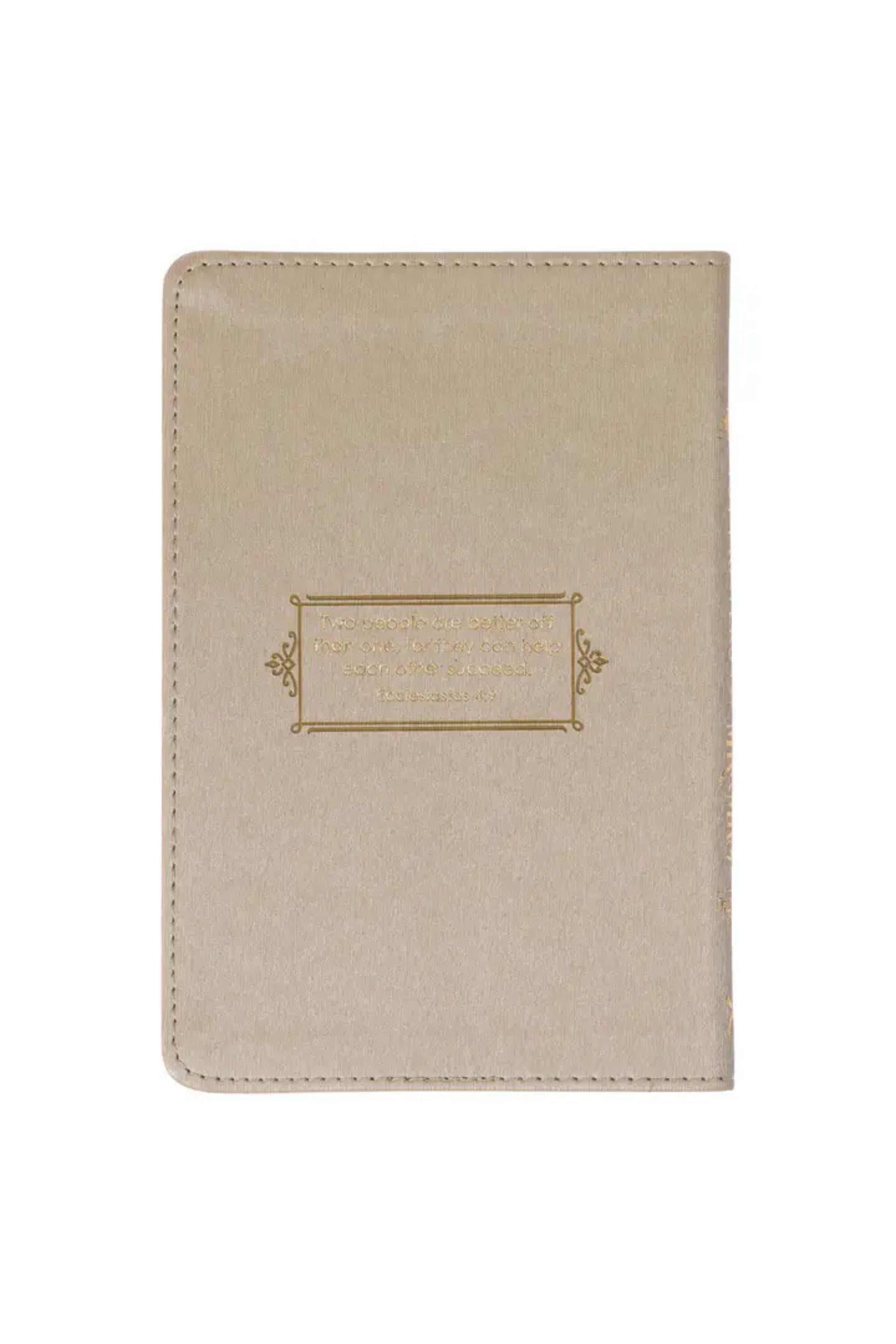 Beige fabric cover with gold embroidery on a white background