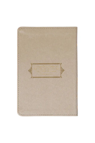 Beige fabric cover with gold embroidery on a white background