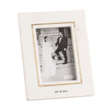 White photo frame with 'mr. & mrs.' text containing a black and white photo of a couple.