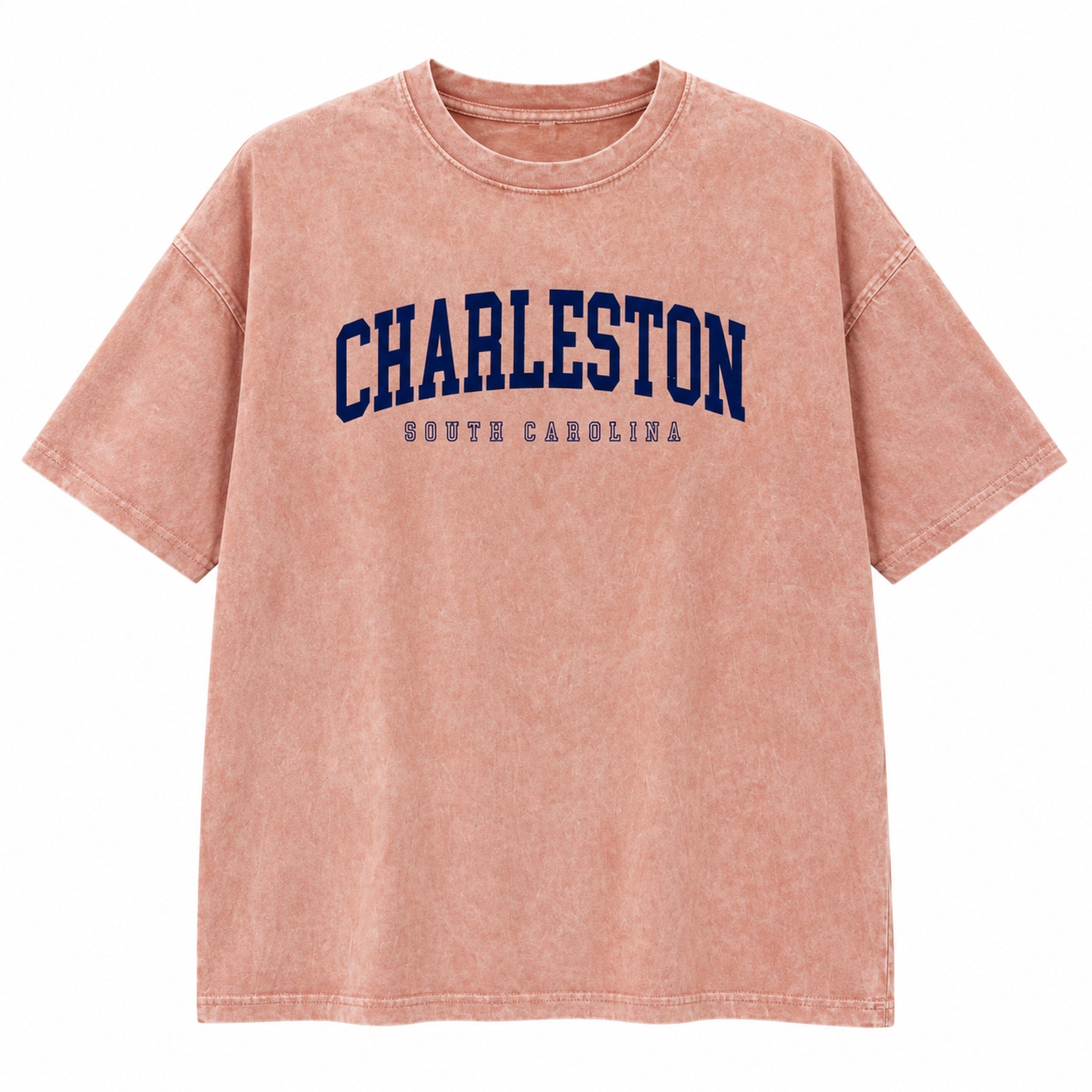 Dusty peach washed Charleston South Carolina graphic tee with navy lettering, front view