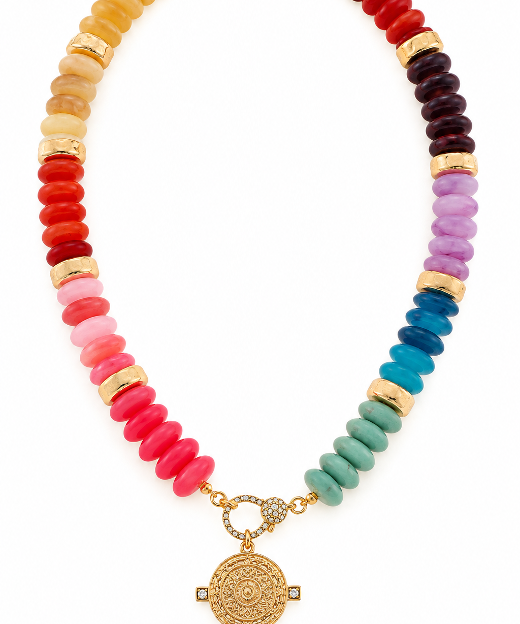 Multicolor coastal medallion beaded necklace featuring pink, coral, yellow, purple, blue, and turquoise acrylic rondelle beads, gold-tone accents, and an ornate medallion pendant.