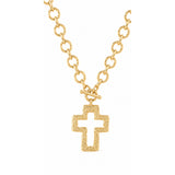 Worn gold outline cross necklace studio image