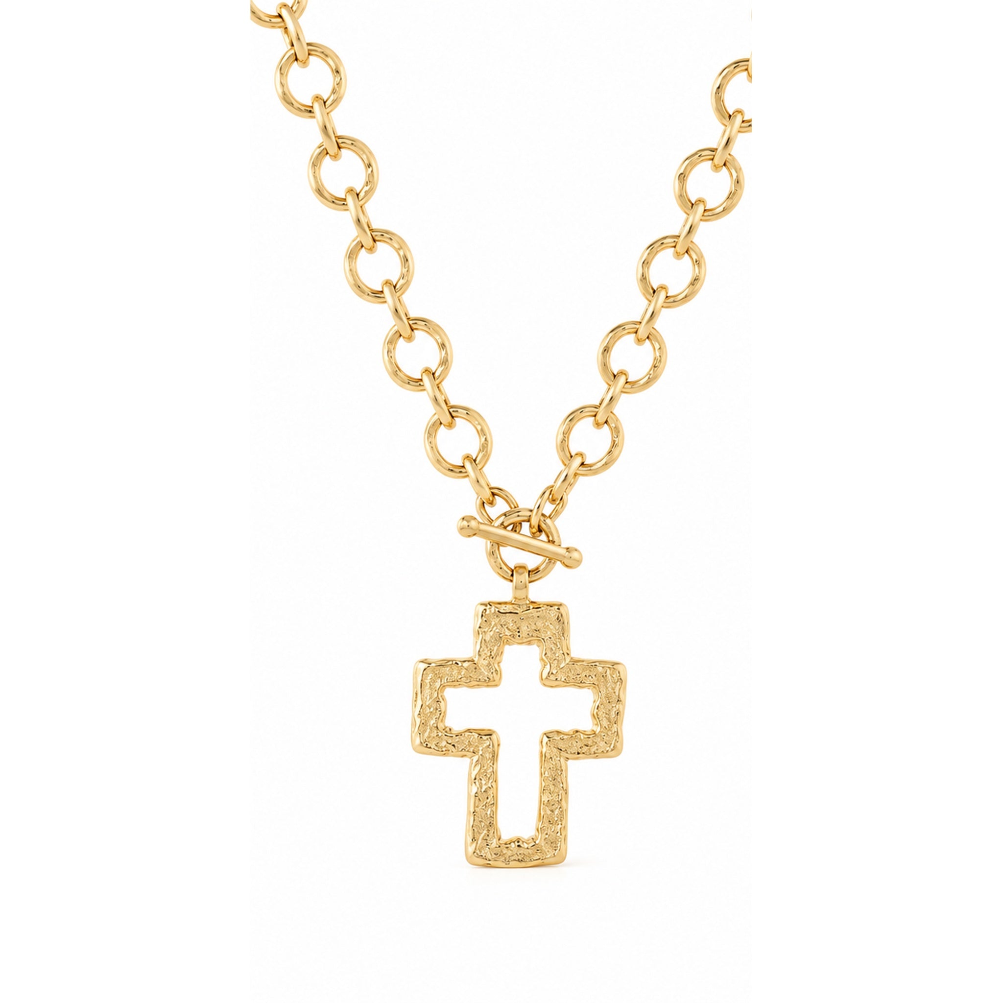 Worn gold outline cross necklace studio image