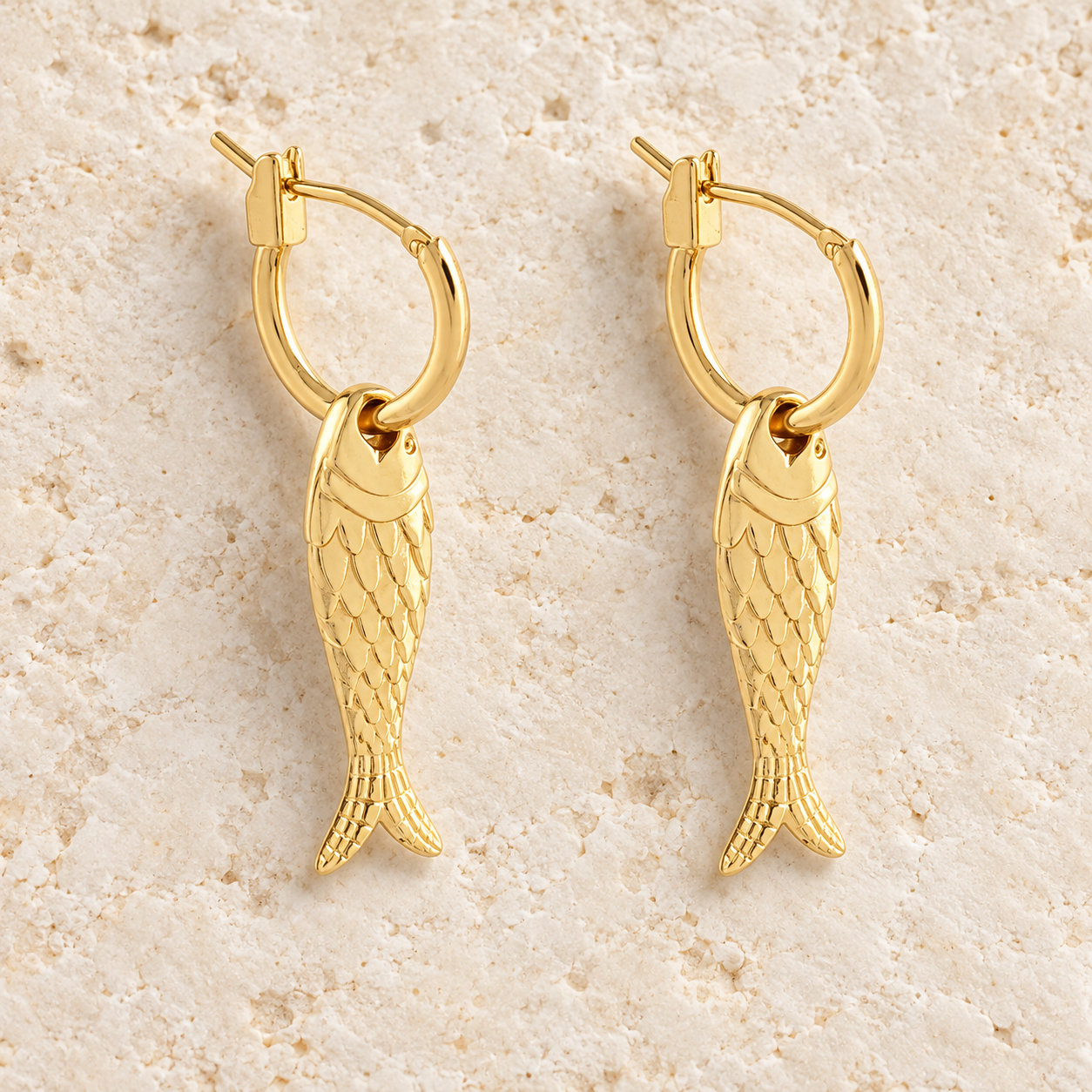 Gold-dipped fish charm drop earrings with polished mini hoops