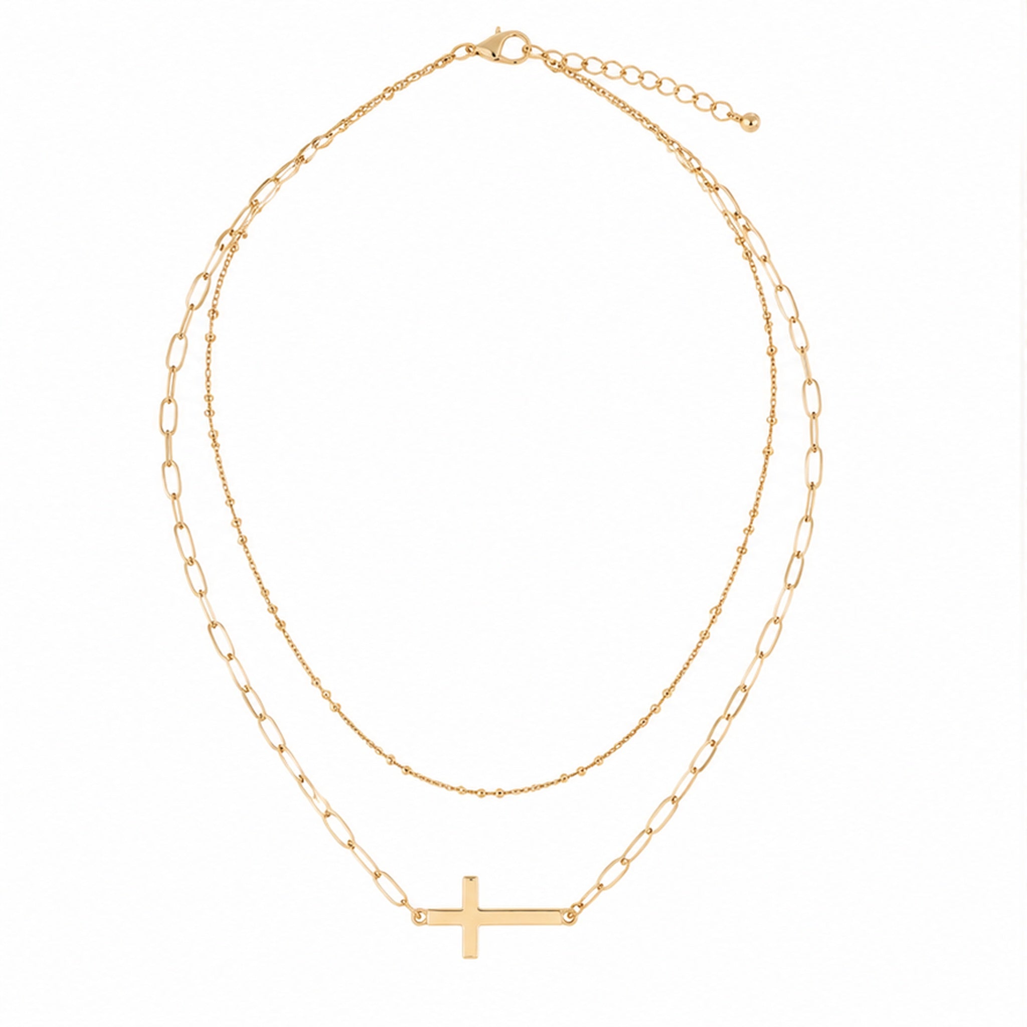 Layered gold sideways cross necklace studio photo