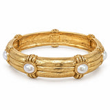 Cream Oval Stone Station Bangle Bracelet with textured gold-tone band and raised stone stations on white