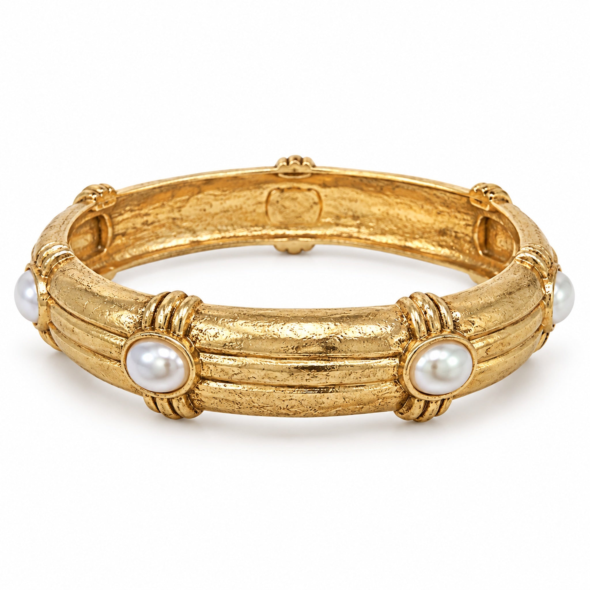 Cream Oval Stone Station Bangle Bracelet with textured gold-tone band and raised stone stations on white