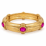 Fuchsia Oval Stone Station Bangle Bracelet with textured gold-tone band and raised stone stations on white