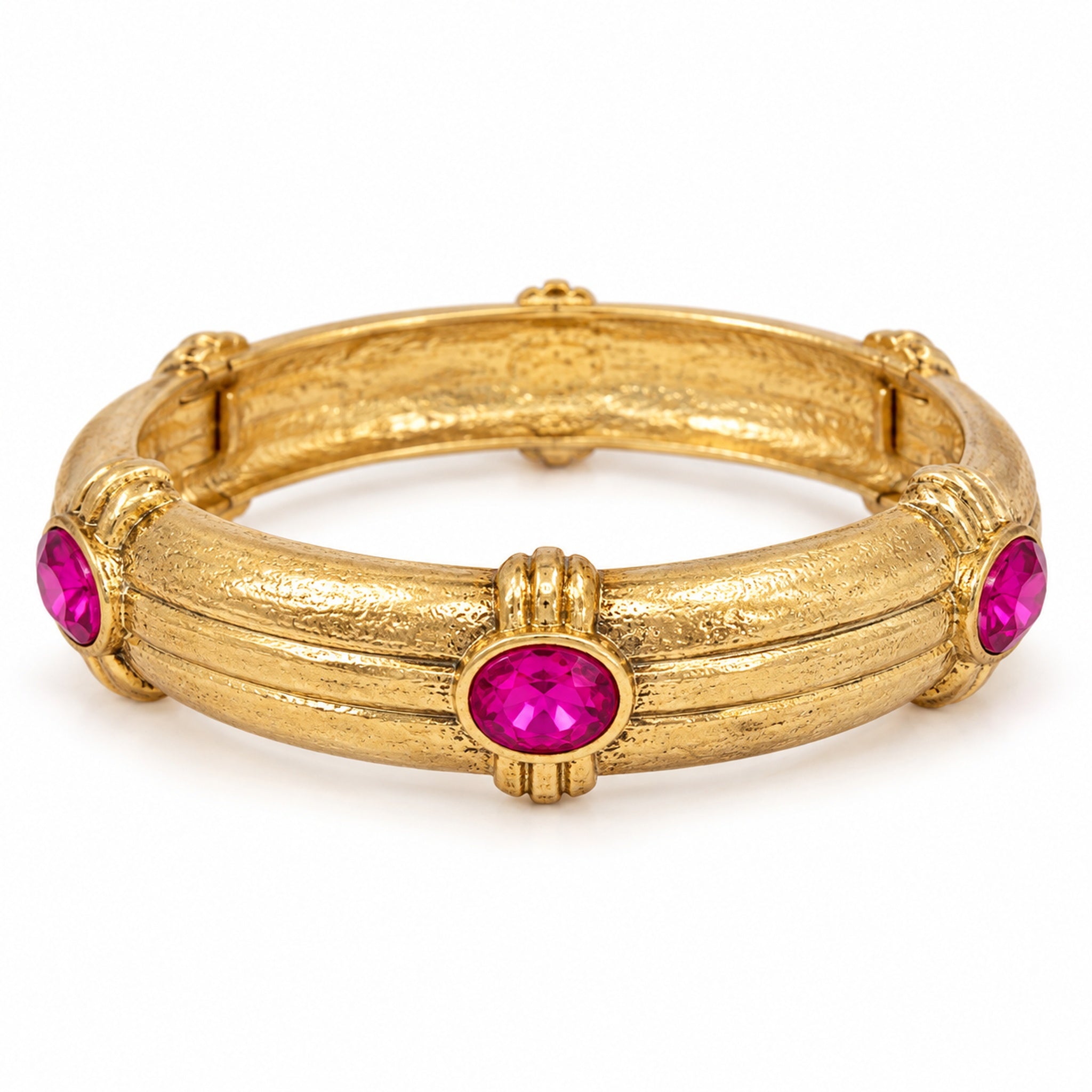 Fuchsia Oval Stone Station Bangle Bracelet with textured gold-tone band and raised stone stations on white