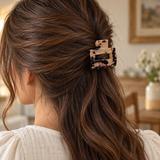 Blonde Tortoise rectangle claw hair clip worn in a brunette half-up hairstyle