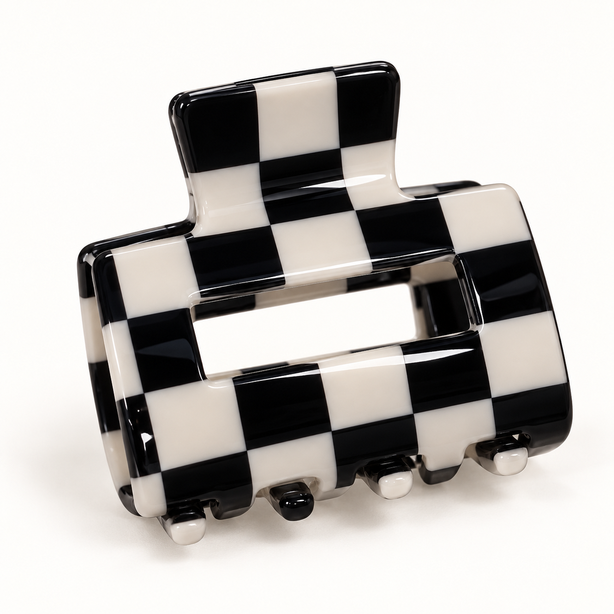 Checkered rectangle claw hair clip on a white background