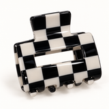 Checkered rectangle claw hair clip on a white background