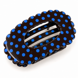 Blue Polka Dot scalloped oval claw hair clip on a white background